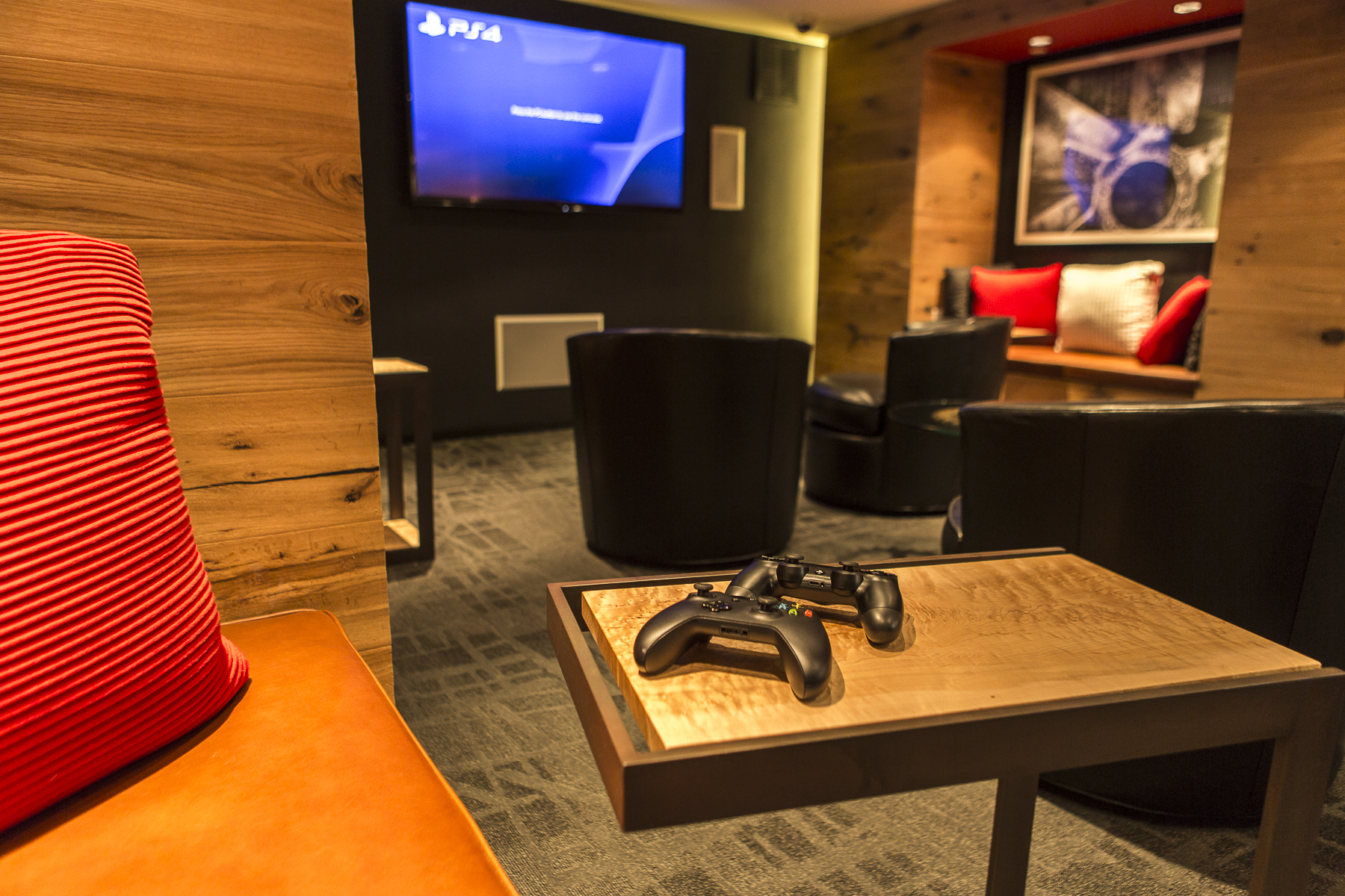 PLAY, a Game Room with both XBox One and PlayStation 4 consoles and a 70-inch flat screen